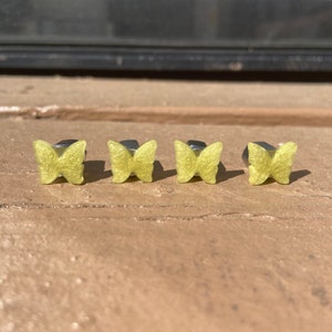 BANANA - butterfly valve stem caps