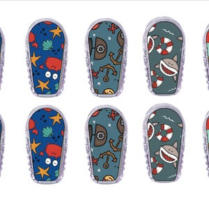 May include: Set of ten colorful adhesive patches featuring various nautical themes, including sharks, crabs, anchors, and life preservers. The patches are designed for use on medical devices.