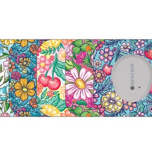 May include: A decorative medical device cover featuring a vibrant floral pattern. The design includes various flowers, fruits, and leaves in a colorful arrangement. The cover has a gray circular component with the text "dexcom".