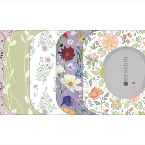 May include: A collection of floral patterned medical device covers. Designs include lavender, green, white, and purple floral patterns. One cover features a gray circular device with the text "dexcom".