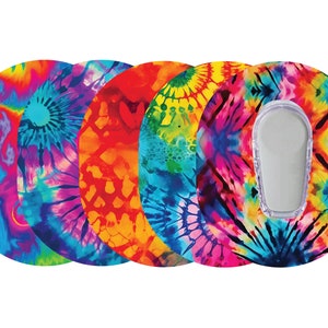 May include: Four colorful tie-dye patterned insulin pump infusion sets. The infusion sets are round and have a clear plastic window in the center.