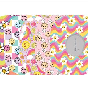 May include: A collection of patterned adhesive patches for a medical device. Designs include smiley faces, rainbows, flowers, and wavy patterns in a vibrant color palette of pink, yellow, and purple. One patch has a gray device attached.