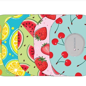 May include: Set of four colorful round stickers with different fruit designs. The stickers feature a watermelon, strawberries, cherries, and lemons and oranges. The stickers have a white background with a black "dexcom" logo in the center.
