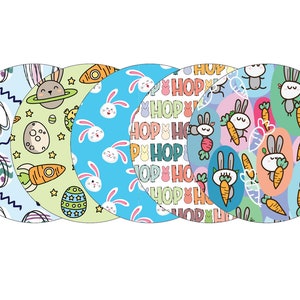 May include: Four round, colorful, patterned Easter-themed stickers with bunnies, carrots, eggs, and the word "HOP" repeated.