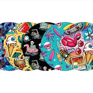 May include: A collection of five circular designs with a summer and beach theme. Each design features vibrant colors and illustrations, including skulls, ice cream cones, surfboards, and a flamingo. The designs are set against various backgrounds.