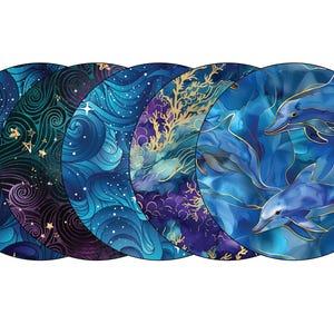 May include: Five round blue and purple coasters with different designs. One coaster features a galaxy design with gold stars, another has a swirling wave pattern, a third has a coral reef design, a fourth has a wave pattern with gold accents, and the fifth has a dolphin design with gold accents.