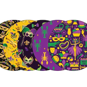 May include: Four round purple, yellow, and black patterned coasters with Mardi Gras themed designs. The coasters feature masks, crowns, musical notes, and other festive symbols.