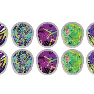 May include: Eight round stickers with different abstract designs in shades of purple, green, yellow, and white. The stickers have a white border.