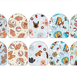 May include: Set of 10 dog-themed nail decals featuring various summer-themed patterns. The patterns include ice cream cones, beach balls, pineapples, and dogs wearing sunglasses. The decals are on a white background.