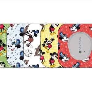 May include: A collection of patterned medical device covers featuring Mickey Mouse. Designs include Mickey in various poses on green, blue, white, and yellow backgrounds. One cover has a gray device with the text "dexcom" on a red background.