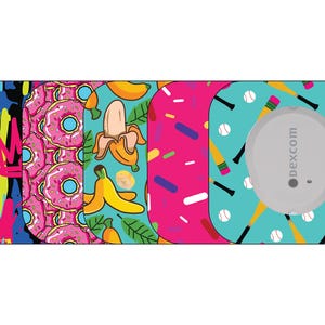 May include: A collection of Dexcom G6 sensor covers with various designs. The designs include graffiti art, pink donuts, bananas, sprinkles, and baseball bats with baseballs. The Dexcom sensor is gray and has the word "dexcom" printed on it.