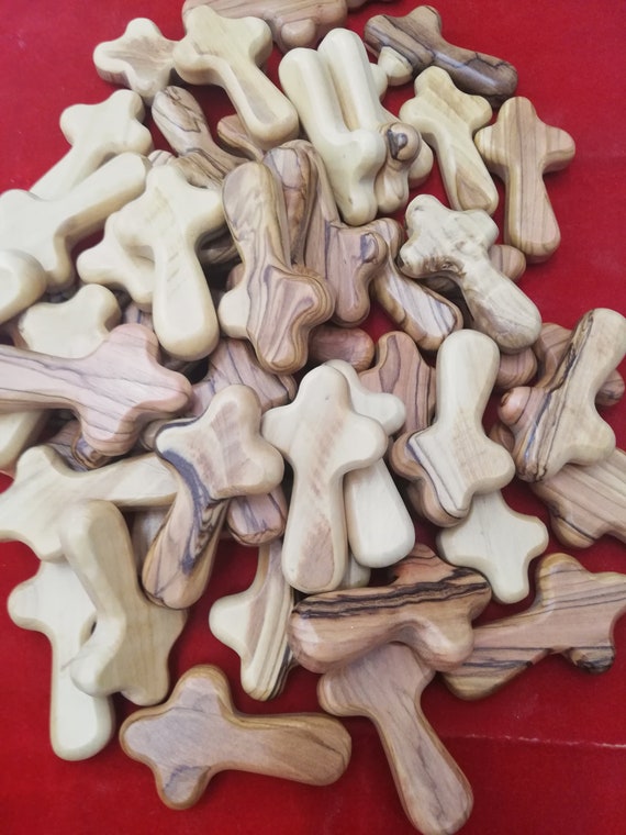 Comfort cross 6.5 cm (30) piece . hand carved olive wood comfort cross by christian families in the holy land . ((free shipping )) .
