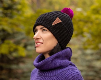 Black knitted merino wool hat for women with four colorful pompoms