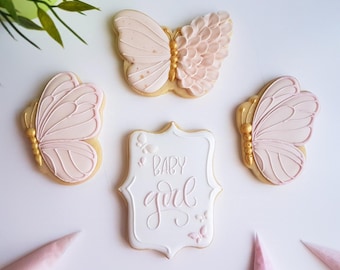 Biscuits papillons roses, biscuits marque-places, biscuits pour bébé fille, cadeaux de naissance, table de douceurs pour baby shower, papillons roses