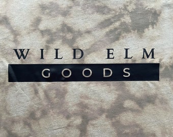 Wild Elm Good's Logo