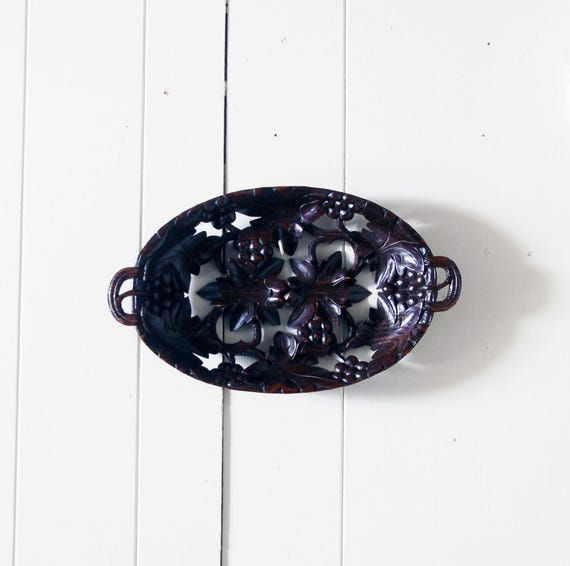 A genuine antique Black Forest hand-carved wooden tray dripping with intricate leaf and berry relief work — the kind of 19th-century European craft that collectors lose sleep over.
