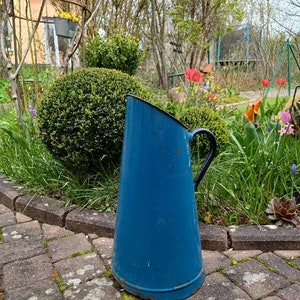 Huge, old, blue enamel water jug