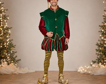 May include: A festive elf costume featuring a dark green velvet vest with gold buttons, worn over long red velvet sleeves. The outfit includes red and green striped puffy shorts, yellow and black horizontal striped leggings, and metallic gold pointed shoes.