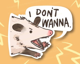 May include: A cartoon illustration of a possum with an open mouth and sharp teeth. The possum is saying "I don't wanna." in a speech bubble. The background is a yellow color with lightning bolt designs.