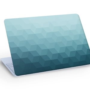 May include: A blue laptop with a geometric pattern on the lid. The pattern is made up of small, light blue and dark blue squares.