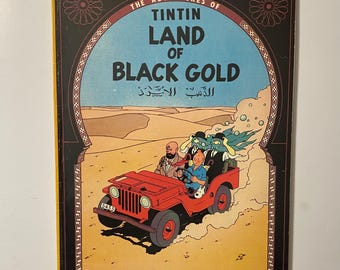 TINTIN, Tin Tin. The Land of Black Gold. Vintage Comic. Softcover Book. Magnet Edition Published in 1979. English Edition.