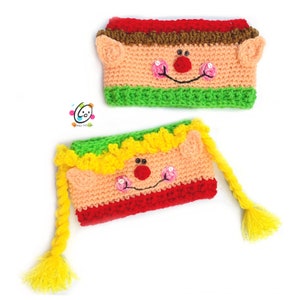 May include: Two crocheted elf pencil cases. One is green, red, and brown with brown elf ears. The other is yellow, red, and green with yellow elf ears.