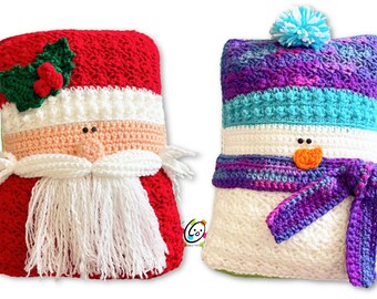 Peut inclure: Deux décorations de Noël faites à la main au crochet : un Père Noël et un bonhomme de neige. Le Père Noël a un chapeau rouge avec une barbe blanche et un accent de houx. Le bonhomme de neige a un chapeau violet, bleu et blanc, une écharpe et un pompon.