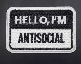 Toppa ricamata da stirare "Ciao, sono antisociale"