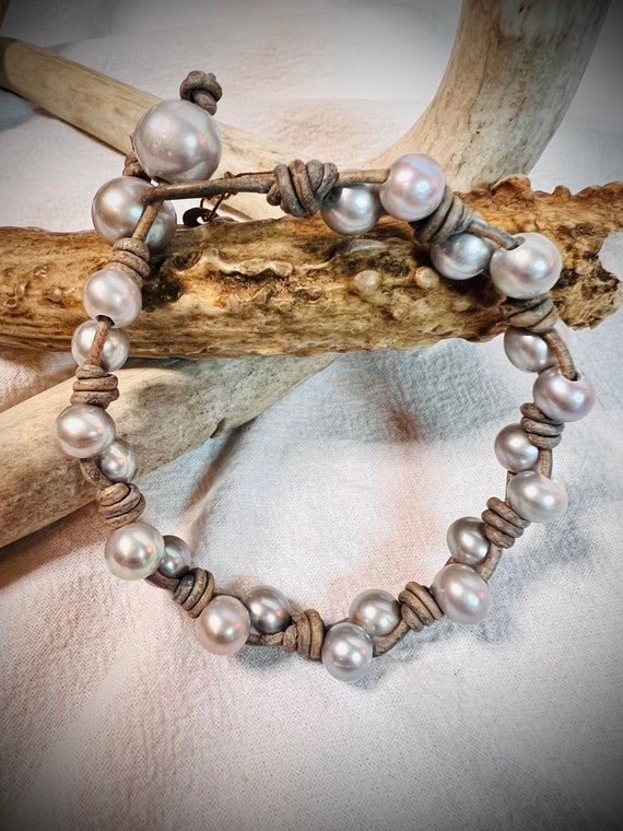 Teal Dyed Cultured Freshwater Pearl Bracelet with Suede Bows Adjustable Length Teal Dyed Cultured Freshwater Pearl Bracelet with Suede Bows Adjustable Length
