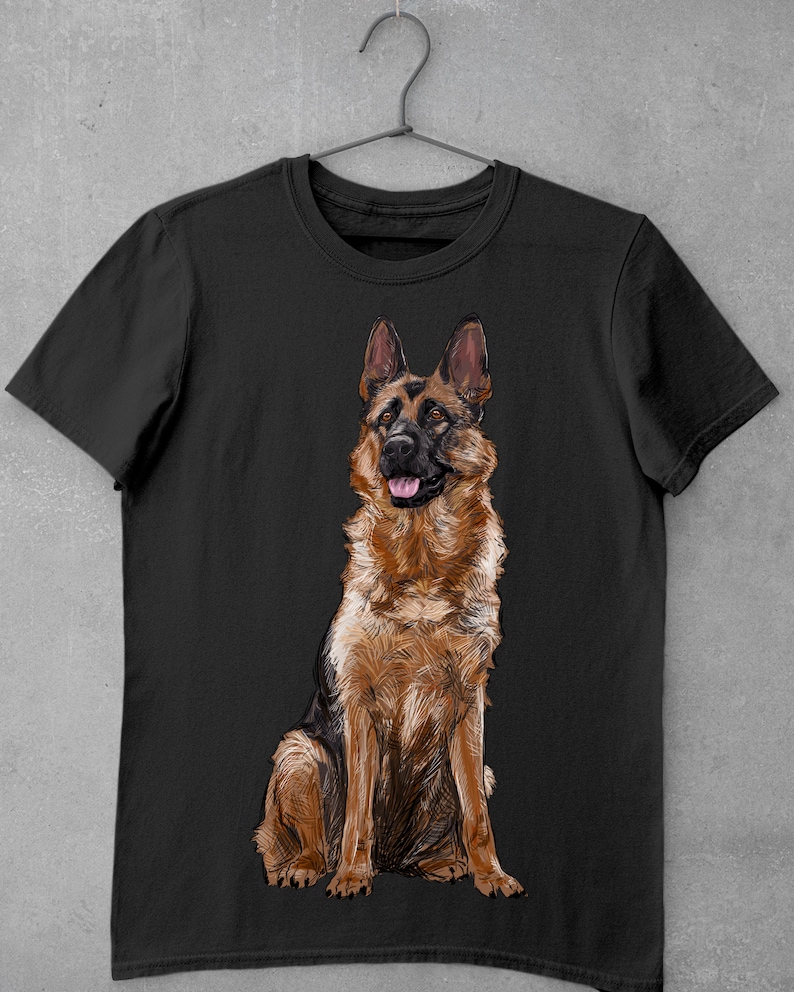 May include: Black t-shirt with a brown and black German Shepherd dog sitting on the front of the shirt.