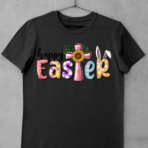 May include: Black t-shirt with a pink cross, a sunflower, and the text "happy Easter" in colorful letters with polka dots and bunny ears.