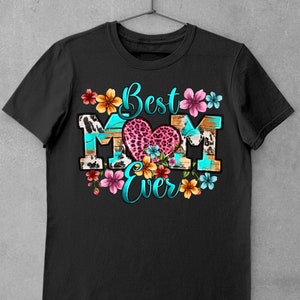 May include: Black t-shirt with a colorful graphic design that says "Best Mom Ever". The graphic features a heart with a leopard print, flowers, and a turquoise background.