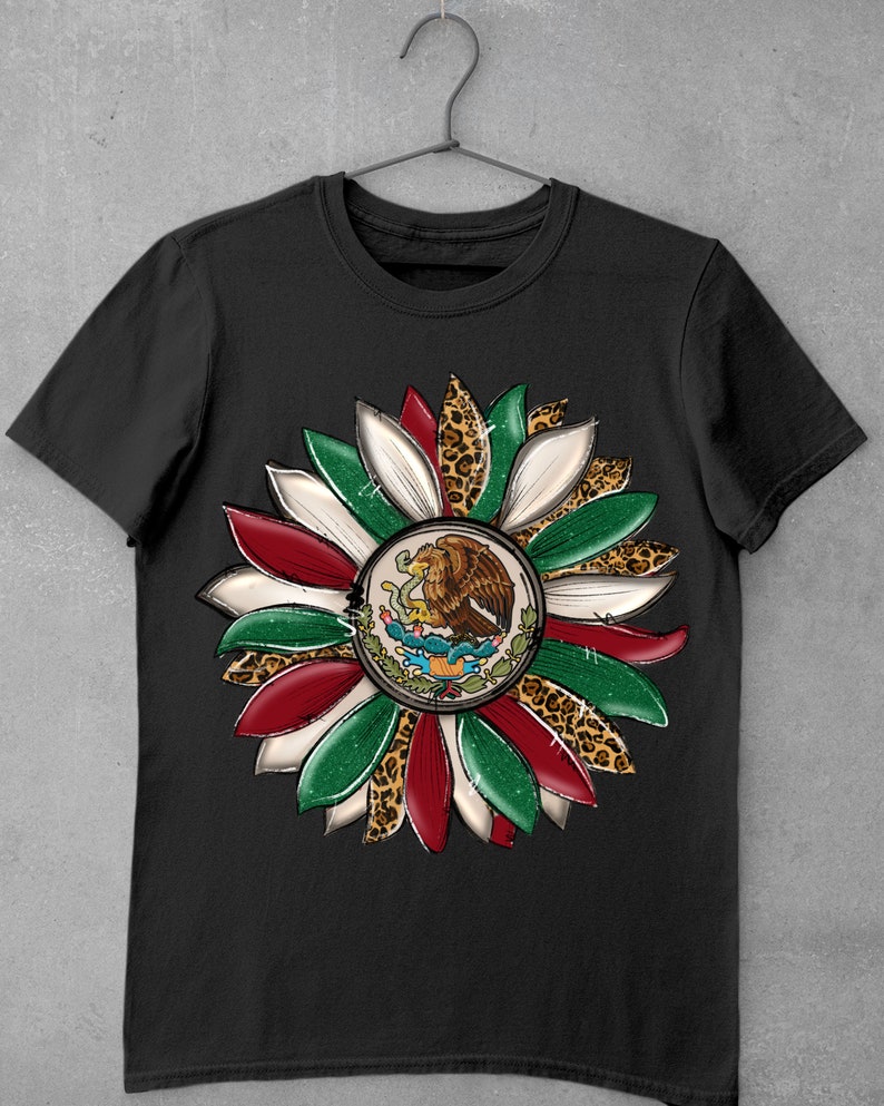 May include: Black t-shirt with a graphic of a sunflower made from the colors of the Mexican flag and leopard print accents.