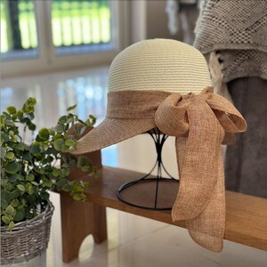 Sun hat with bow clearance