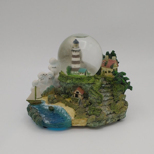 Vintage Lighthouse Nautical Scene Musical Snow Globe, Plays Memory perfectly, 5 1/2" tall, 7" long, 5" deep, Excellent Condition!