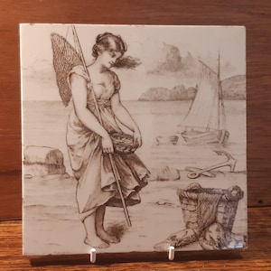 Antique tile Mintons of a woman collecting cockles 1882 William Wise