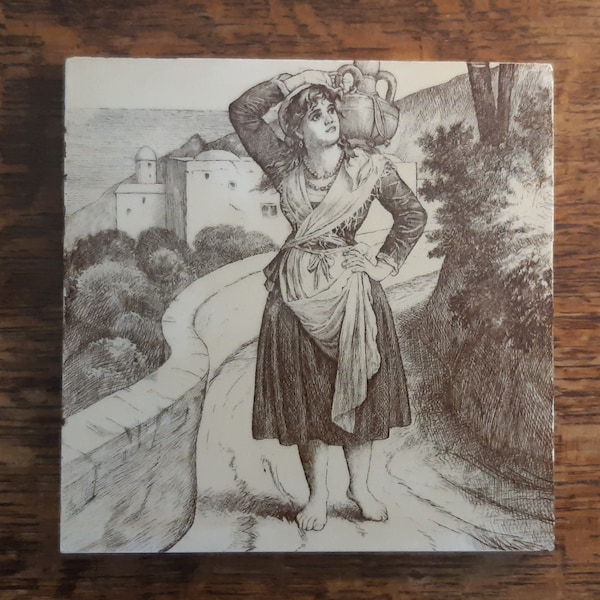 Antique tile by Mintons of a woman carrying an Amorpha 1882