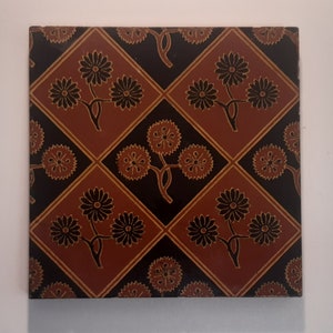 Antique tile by Minton Hollins 1880 in the Arts and Crafts style,