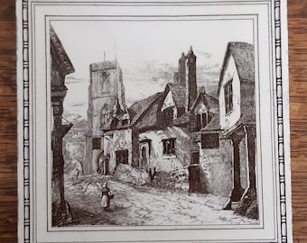 May include: A black and white engraving depicting a street scene with a church tower in the background and several buildings in the foreground. The street is empty except for a single figure walking in the distance.