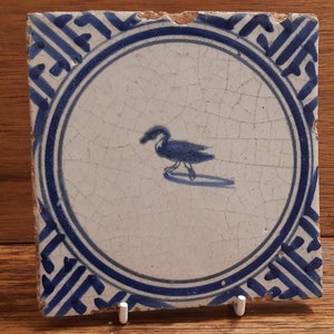 Dutch Delft tile of a duck or swan with Meander border 17th Century
