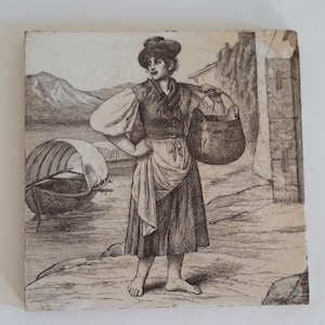 Antique tile by Minton of  a Lady with Yoke and baskets by a River 1882 designed by William Wise