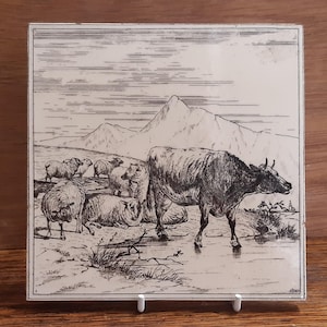 Antique tile of livestock including Cattle and Sheep by Minton Hollins designed by W P Simpson