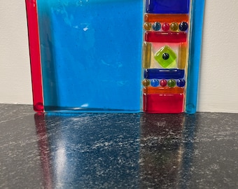 Fused glass tivet