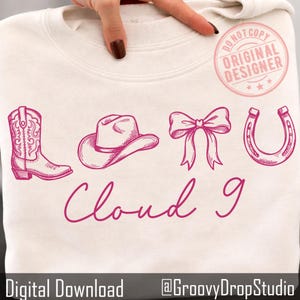 May include: Cream-colored sweatshirt with a pink graphic design featuring a cowboy boot, hat, bow, and horseshoe. The words "Cloud 9" are written in cursive below the images. The words "Digital Download" and "@GroovyDropStudio" are at the bottom.