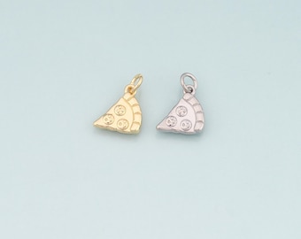 May include: Two pizza slice charms, one gold and one silver, are shown against a light blue backdrop. Each charm has a detailed crust and toppings, ideal for jewellery making or crafting projects.