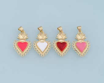 May include: Four gold heart-shaped pendants with different colored enamel inlays. The pendants feature a crown and ornate detailing. The colors are pink, white, red, and light pink.