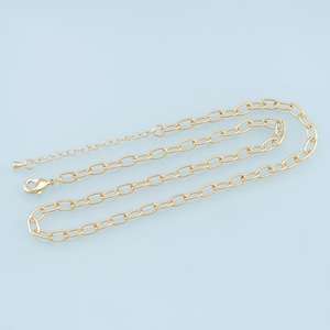 May include: A gold chain necklace with a lobster clasp fastening. The chain is made of oval-shaped links.