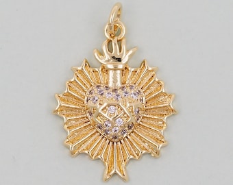 May include: A gold-tone pendant featuring a heart-shaped charm with a crown and a halo of sparkling rhinestones.