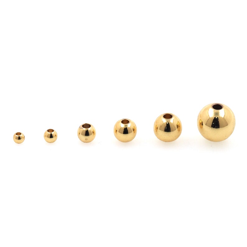 100 Stück Gold-Abstandsperlen-Charms, 18 Karat Gold gefüllte runde Perlen, Armband-Halskette für DIY-Schmuckherstellung Bild 2