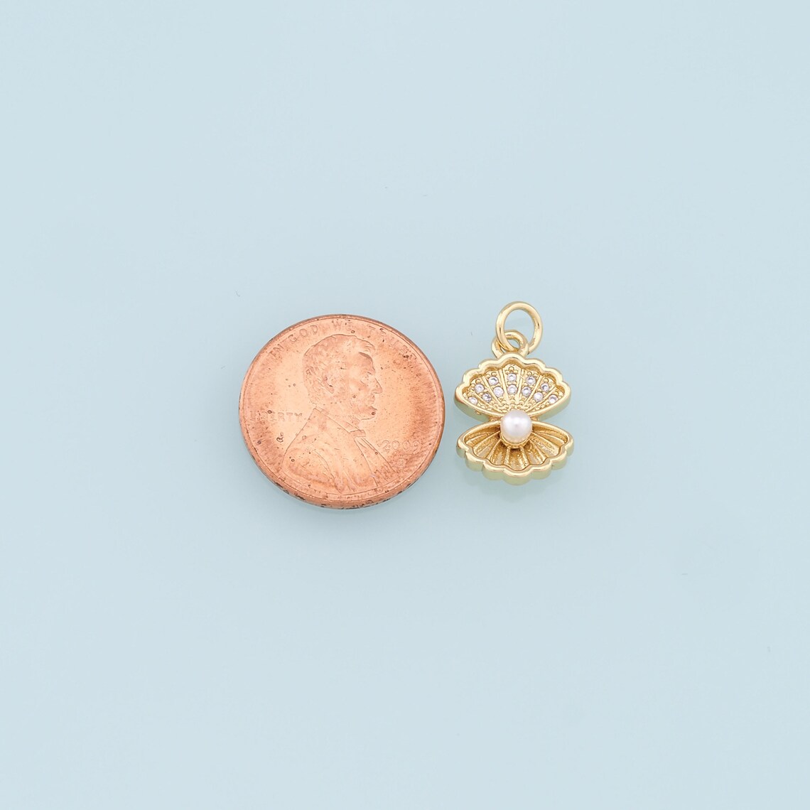 Pearl Shell Charms Necklace in Gold